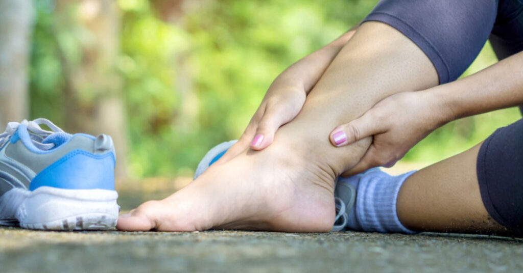 Swollen feet causes runner to remove shoes