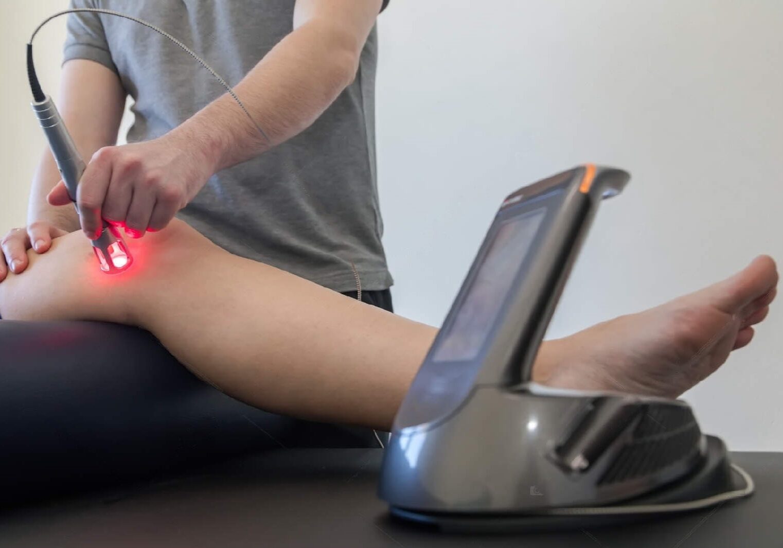 depositphotos_188918040-stock-photo-laser-therapy-on-a-knee-transformed